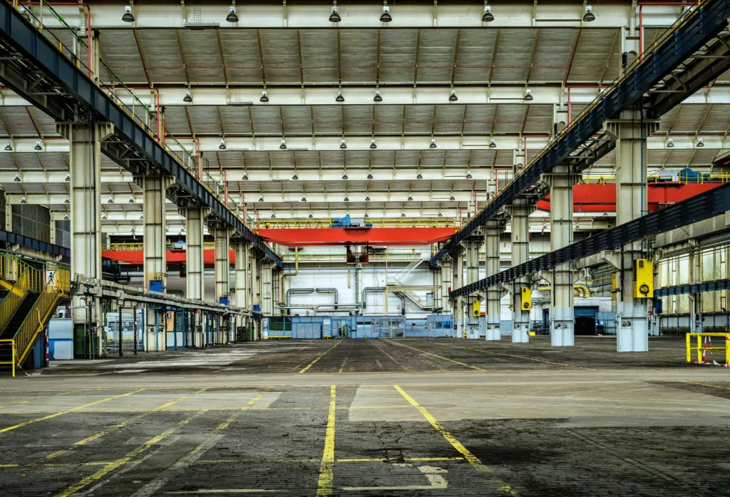 Industrial ride on sweeper for factory workshops and production floors